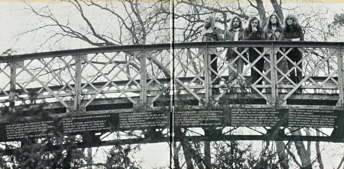 Ein Bild, das Brücke, Gebäude, draußen, Zug enthält.

Automatisch generierte Beschreibung